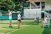 Playing tennis with family